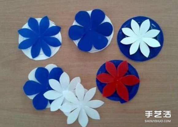 幼儿手工教程：简单又好玩的剪纸弹簧花小制作 -  www.shouyihuo.com