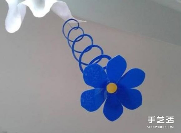 幼儿手工教程：简单又好玩的剪纸弹簧花小制作 -  www.shouyihuo.com